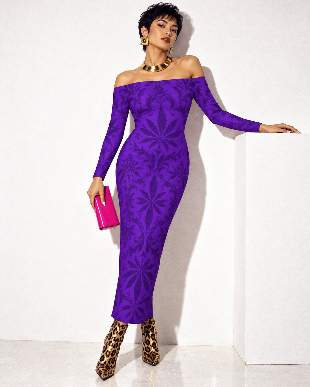 Gelato purple off-shoulder maxi dress with a gold collar, leopard ankle boots and pink clutch; model leans beside a white plinth.