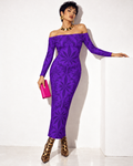 Gelato purple off-shoulder maxi dress with a gold collar, leopard ankle boots and pink clutch; model leans beside a white plinth.