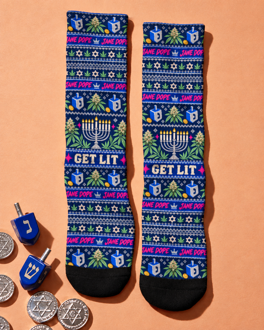 Get Lit Hanukkah crew socks laid flat with dreidels, showing the navy print, cream lettering and black toes.