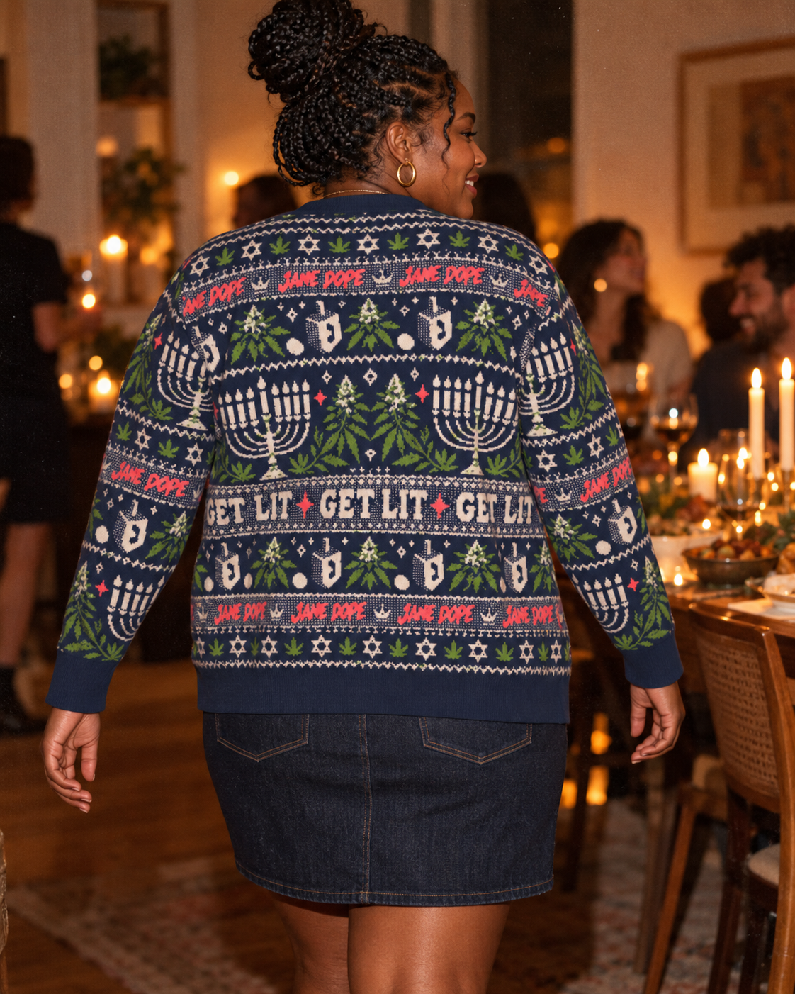 Back view of Get Lit cardigan styled with a dark denim skirt.