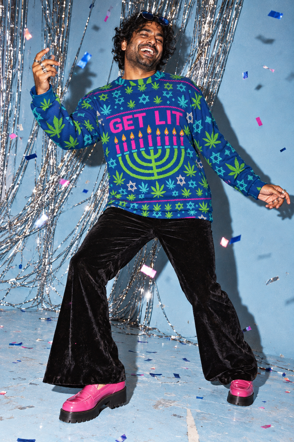 Get Lit Hanukkah Unisex Sweatshirt, size L editorial fit illustration on a blue studio background with sweater-knit-like texture.