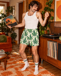 Jane Dope Grass cotton poplin boxers worn with a white tank beside a record player