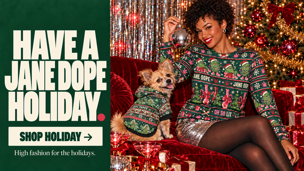 Woman and dog in festive green prints on a red sofa. Have a Jane Dope Holiday.