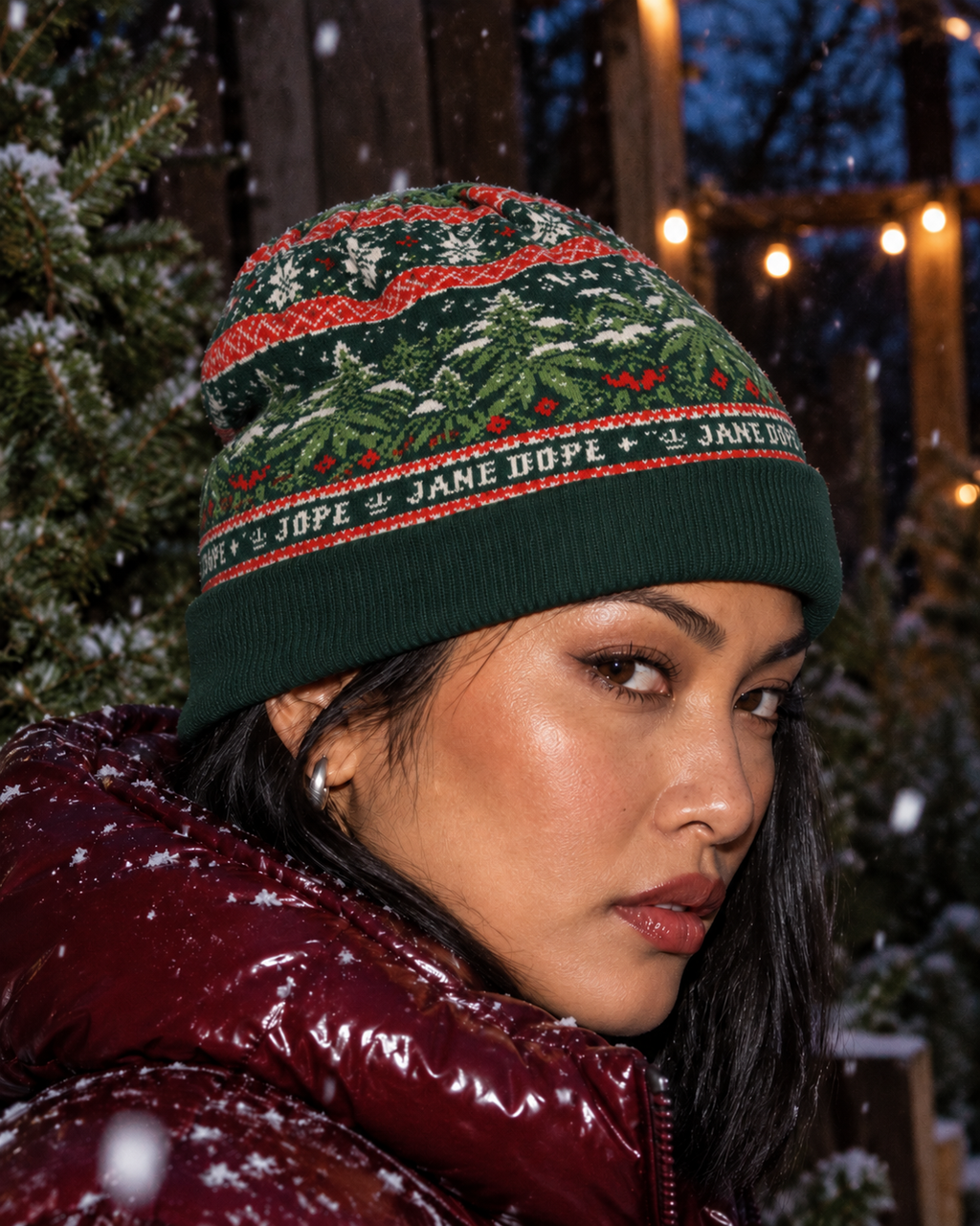 Nugs & Mistletoe Knit Beanie close side view worn with the folded cuff covering the top of the ear