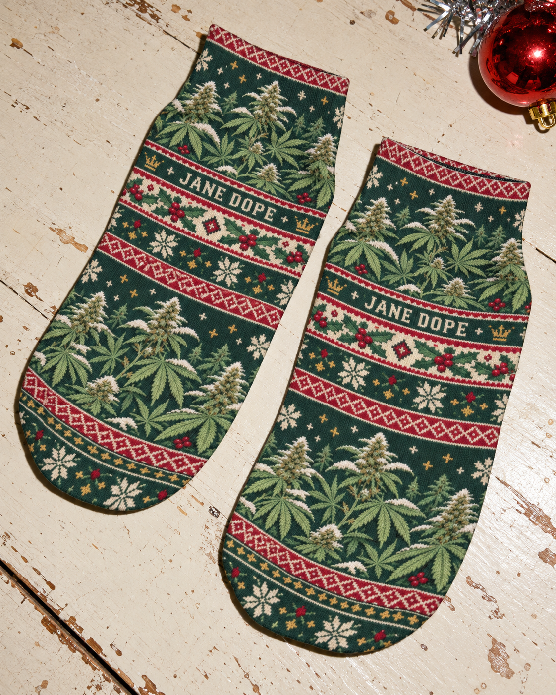 Jane Dope green botanical Christmas ankle socks, pair shown from the front.