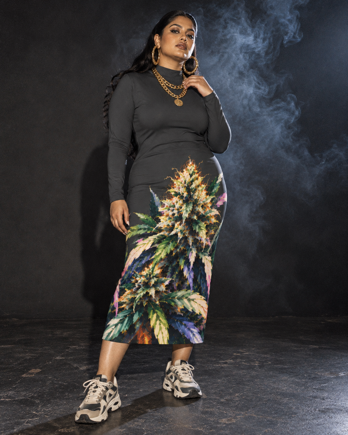 Full-length Permanent Marker Hip Dress with charcoal sleeves and colourful botanical skirt, styled with chunky trainers and gold jewellery.