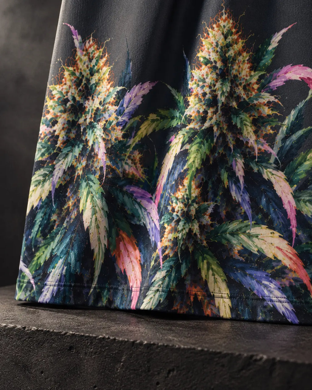 Close-up of the Permanent Marker Pencil Skirt multicolour botanical artwork and stitched hem.