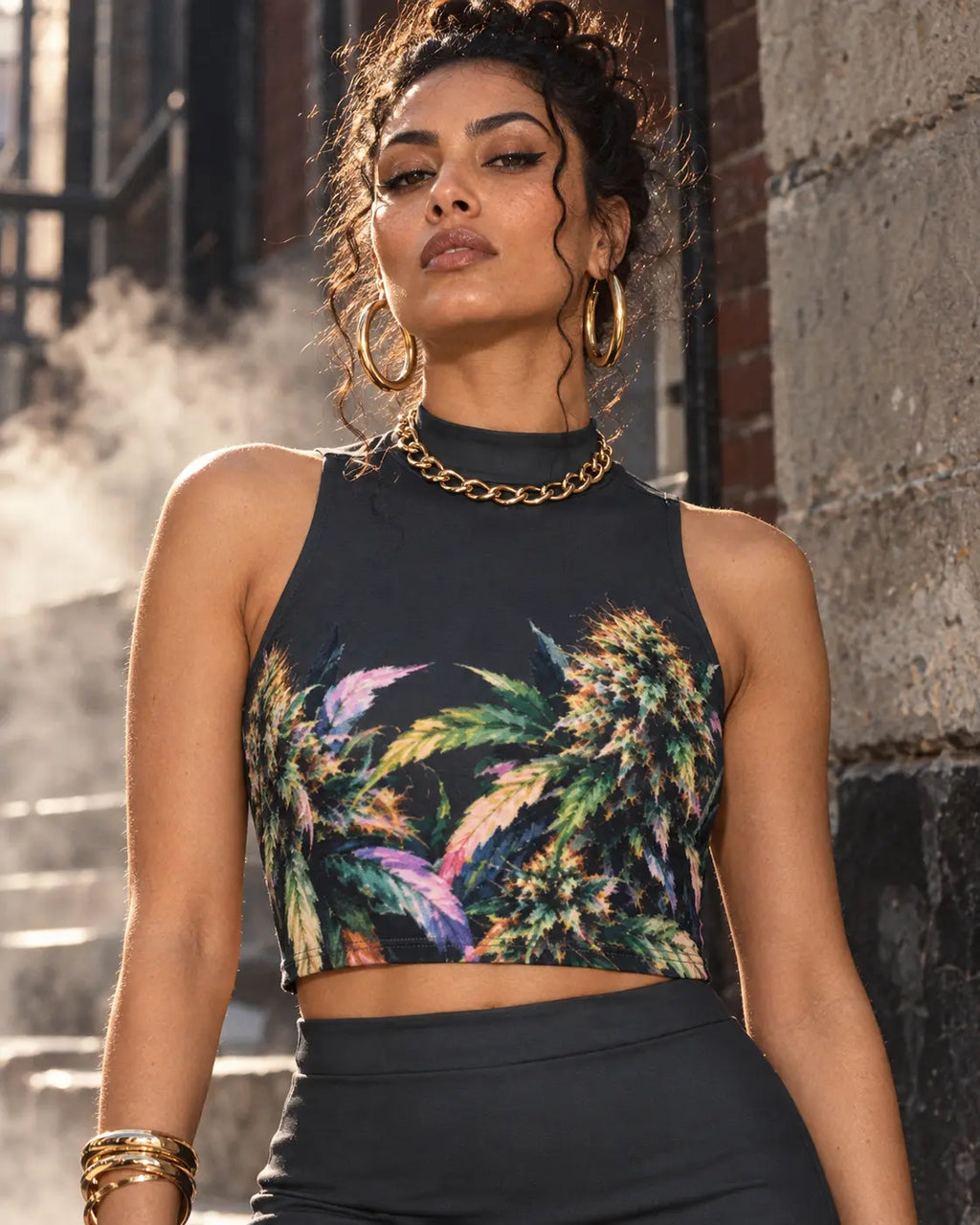 Close view of Permanent Marker cropped tank showing the colourful flower artwork, mock neckline and stitched hem.