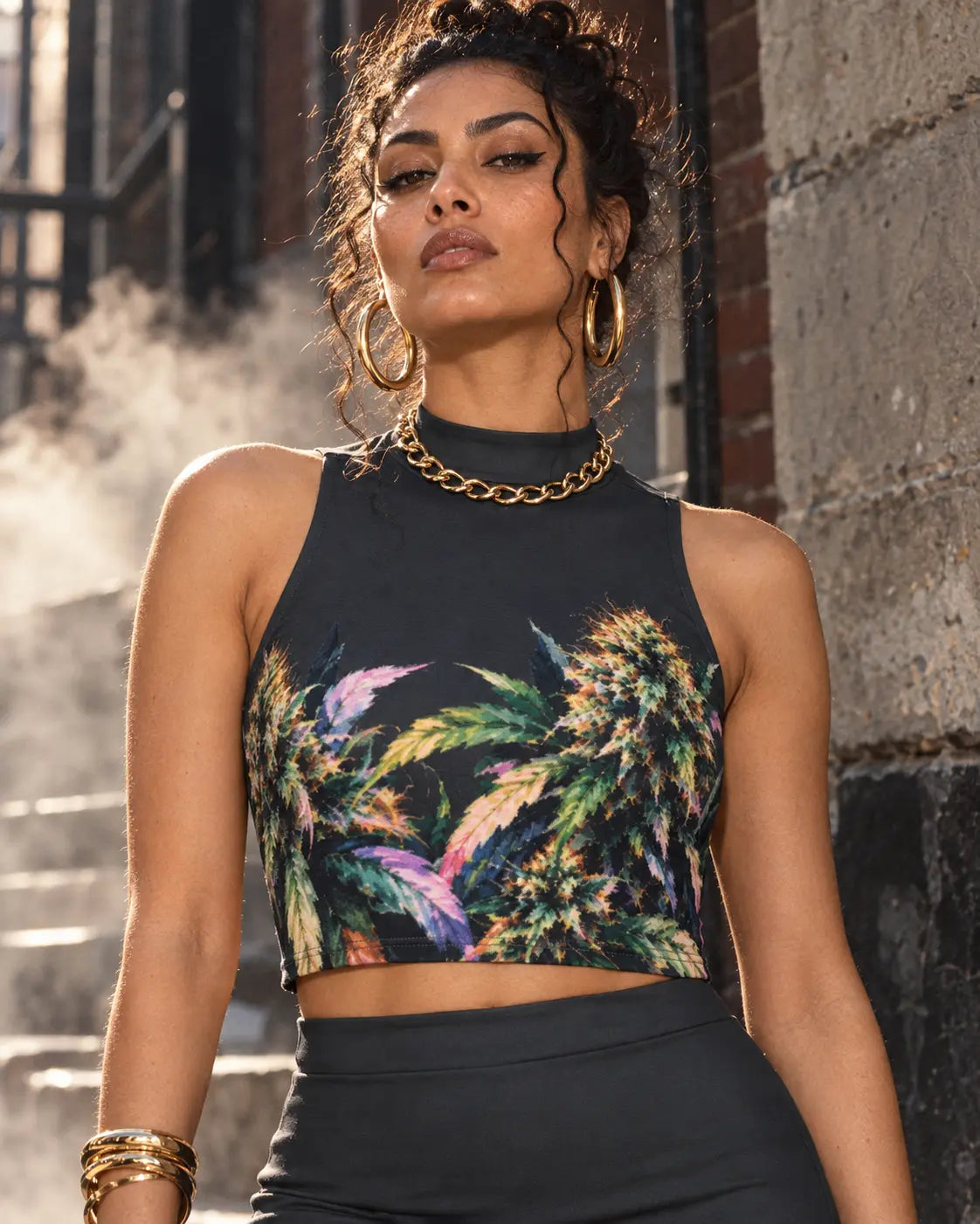 Close view of Permanent Marker cropped tank showing the colourful flower artwork, mock neckline and stitched hem.