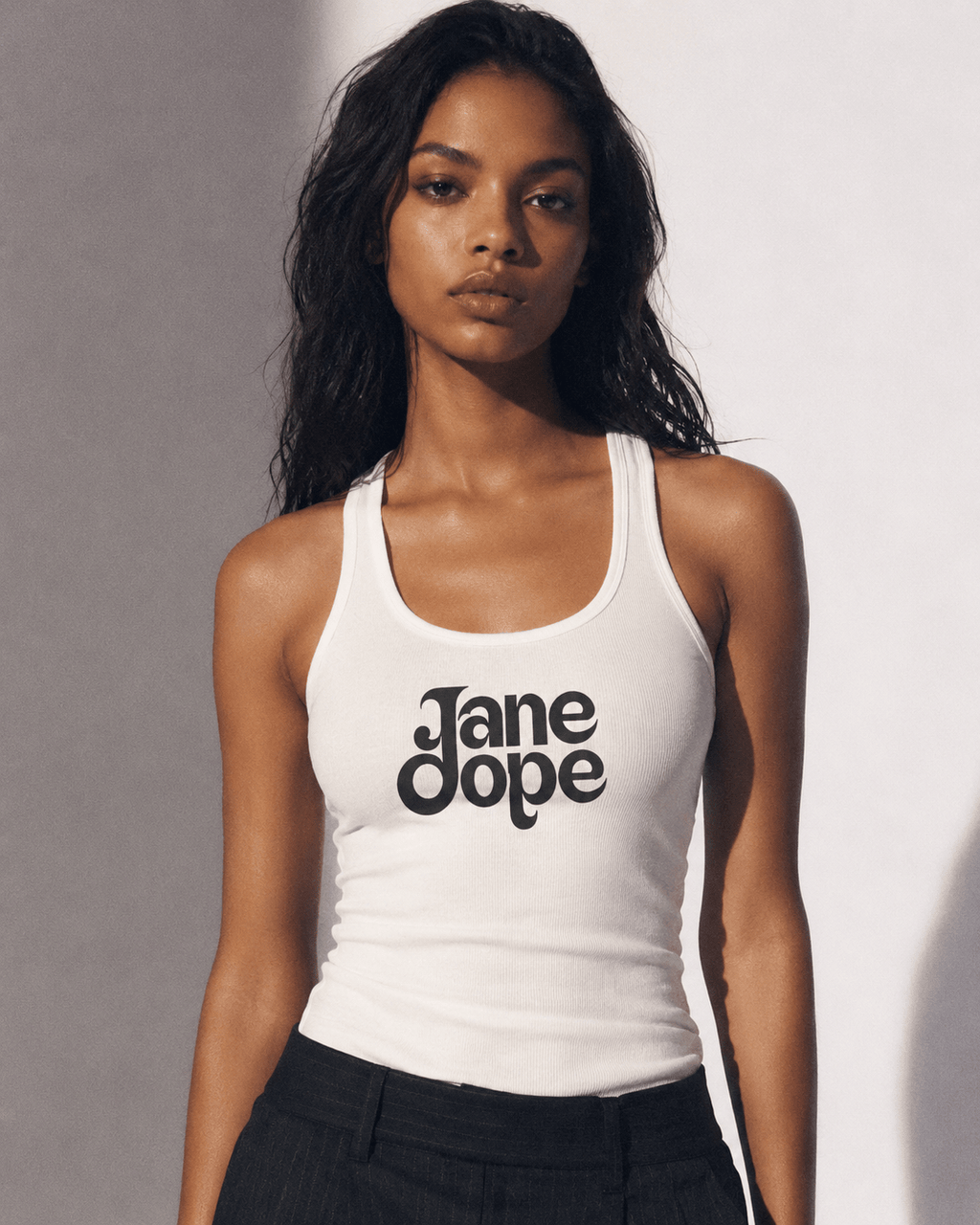 Stoner Diop graphic print racer vest, walking shot on model