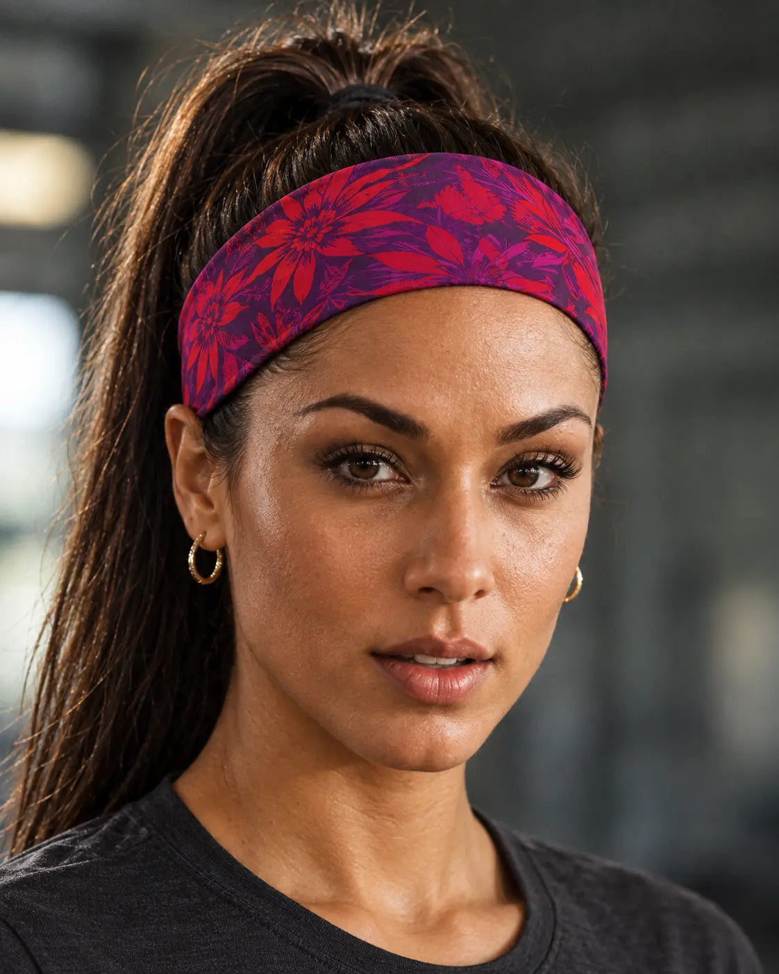 Electric Lettuce Runners High headband close-up showing red botanical print on purple.
