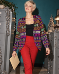 S variant editorial: Sleigh. Smoke. Repeat cardigan with black tank and red trousers