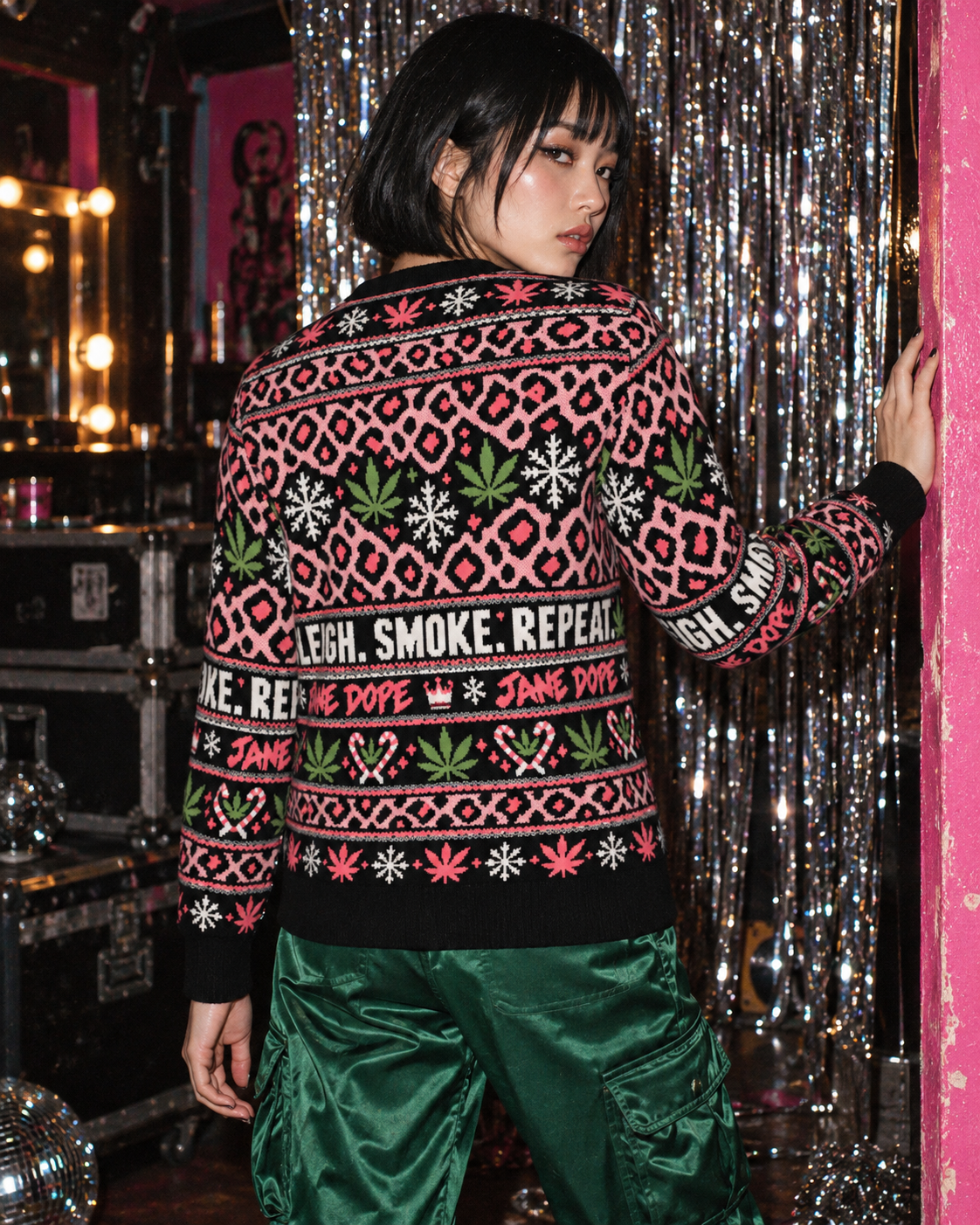 Sleigh Smoke Repeat Xmas Knit Sweater (unisex) S variant fit illustration, back view showing repeating slogan and green satin trousers