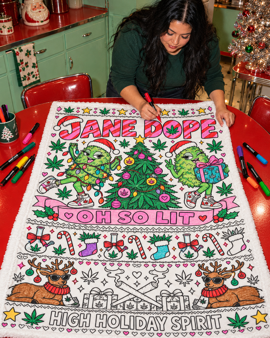 So Lit Xmas colouring inspiration showing an adult adding colour to the partly coloured holiday blanket; supplied uncoloured