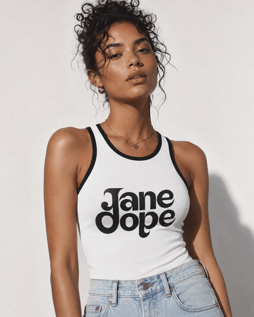 Jane Dope logo print racerback tank top in large, flat lay