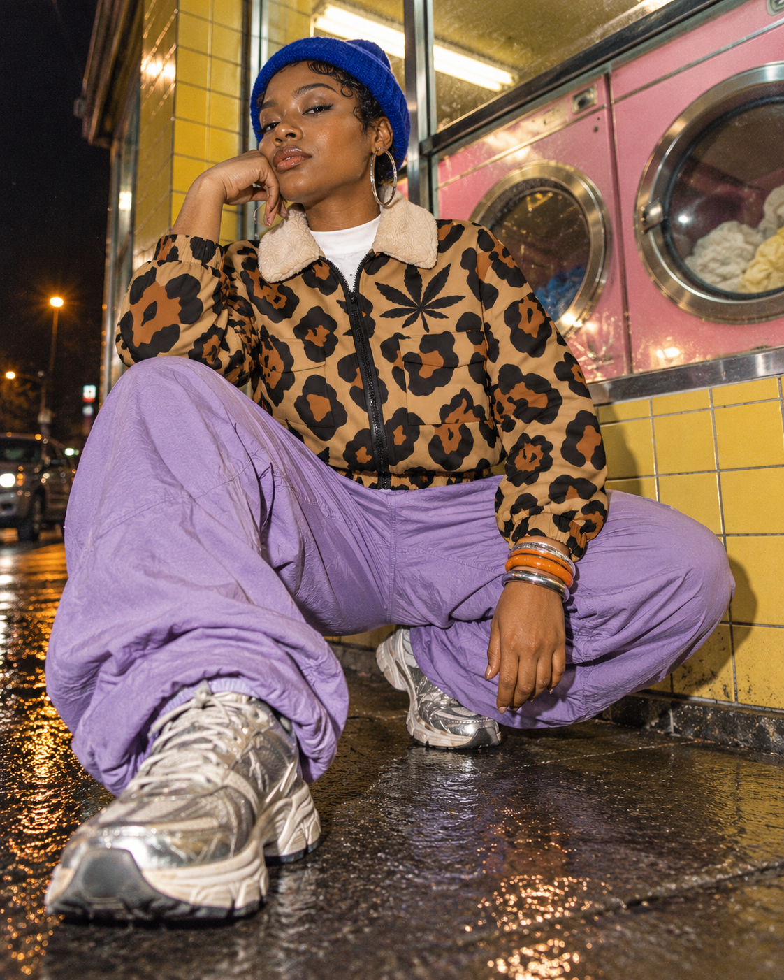 Leopard jacket with black and rust rosettes, Herb leaves and a cream collar. Laundrette B-girl squat lilac trousers; environmental editorial.