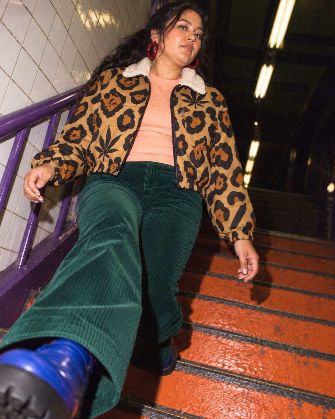 Leopard jacket with black and rust rosettes, Herb leaves and a cream collar. Hardflash subway step with green cords; cropped open jacket.