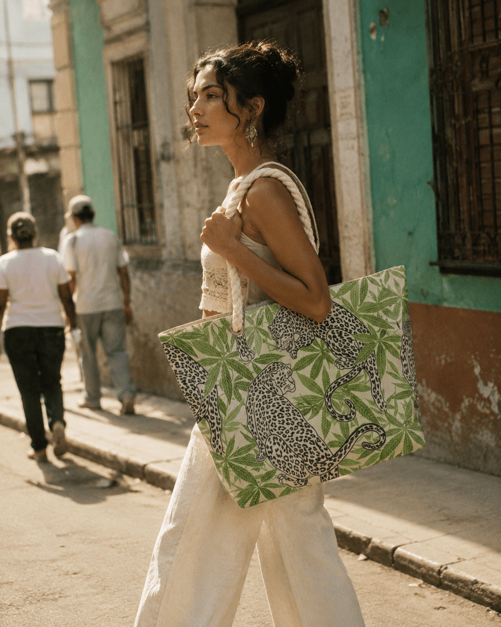 Leopard print canvas tote with hemp rope handles, lifestyle shot on shoulder