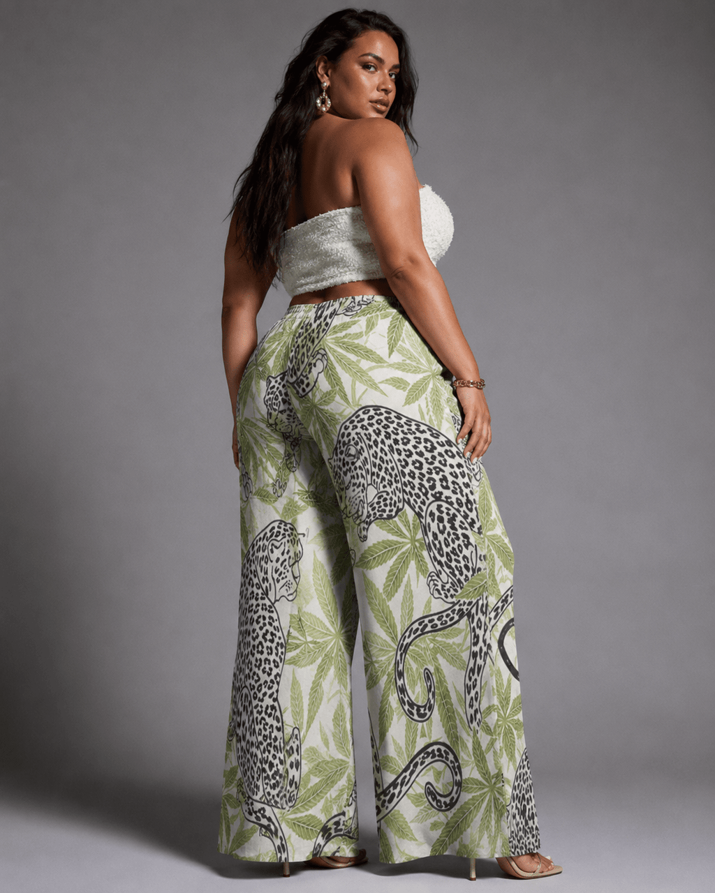 Leopard print wide leg pants, close-up showing fabric and print detail