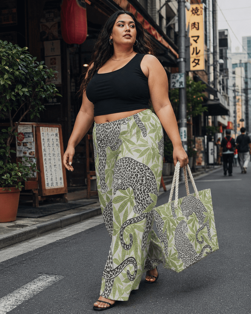 Leopard print wide-leg pants, back view showing full print