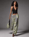 Leopard print wide leg pants, lifestyle editorial shot on model