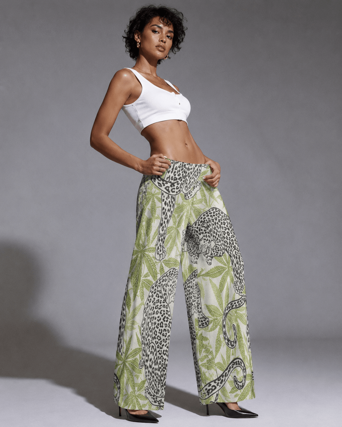 Leopard print wide leg pants, walking shot on model