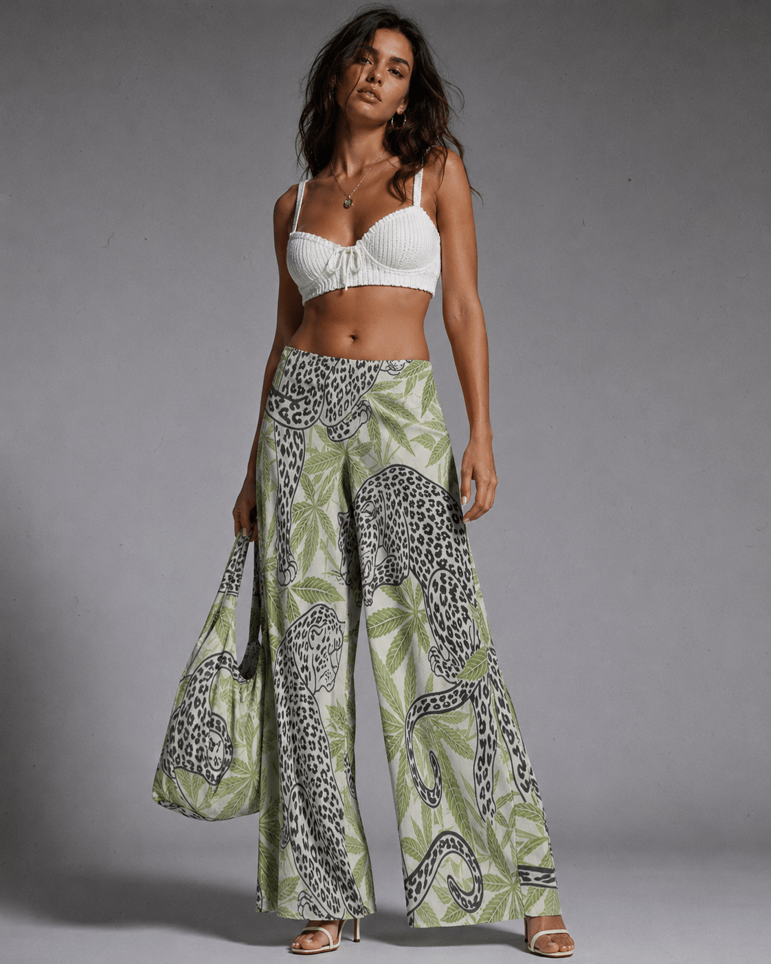 Leopard print wide leg pants, side view on model