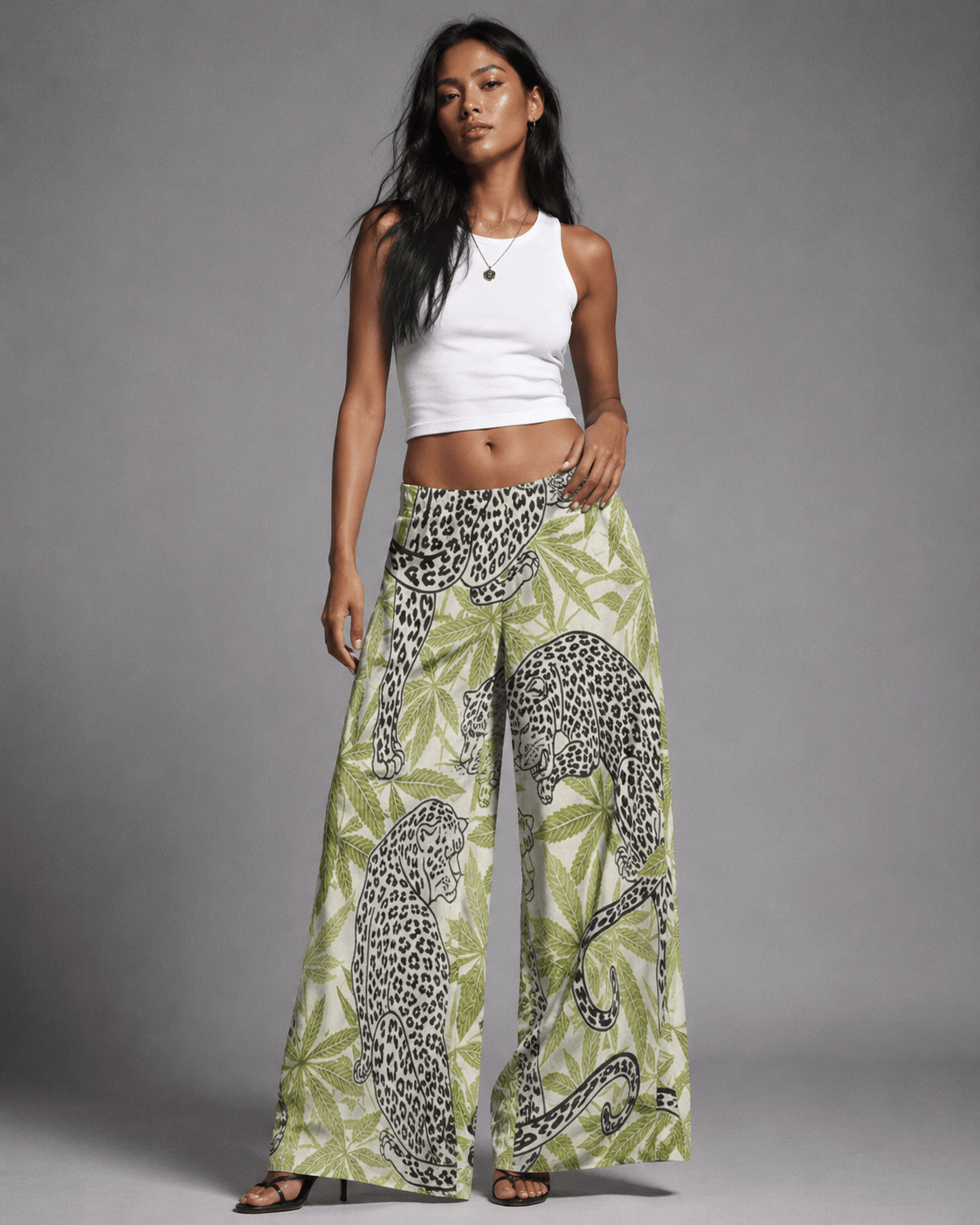 Leopard print wide leg pants, three-quarter view on model