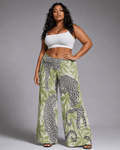 Leopard print wide leg pants, full length view on model outdoors