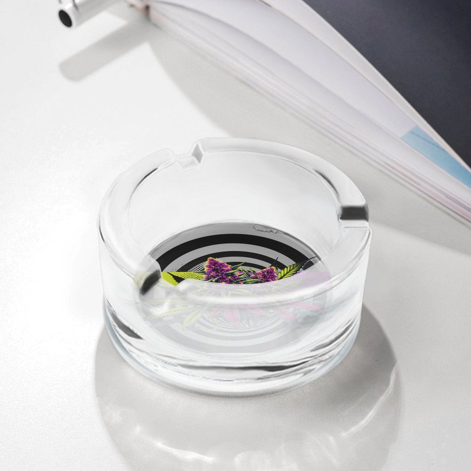 LIT graphic print glass ashtray, angled view showing print detail