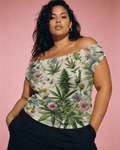 Woman wearing a floral and cannabis leaf patterned top against a pink background