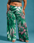 Pink haze floral print wide leg flow pants, full length view on model outdoors