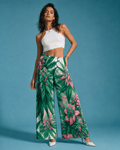 Pink haze floral print wide leg flow pants, back view on model