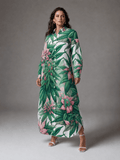 Pink floral print shirt dress, three-quarter view on model