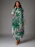 Pink floral print shirt dress, full length view on model outdoors