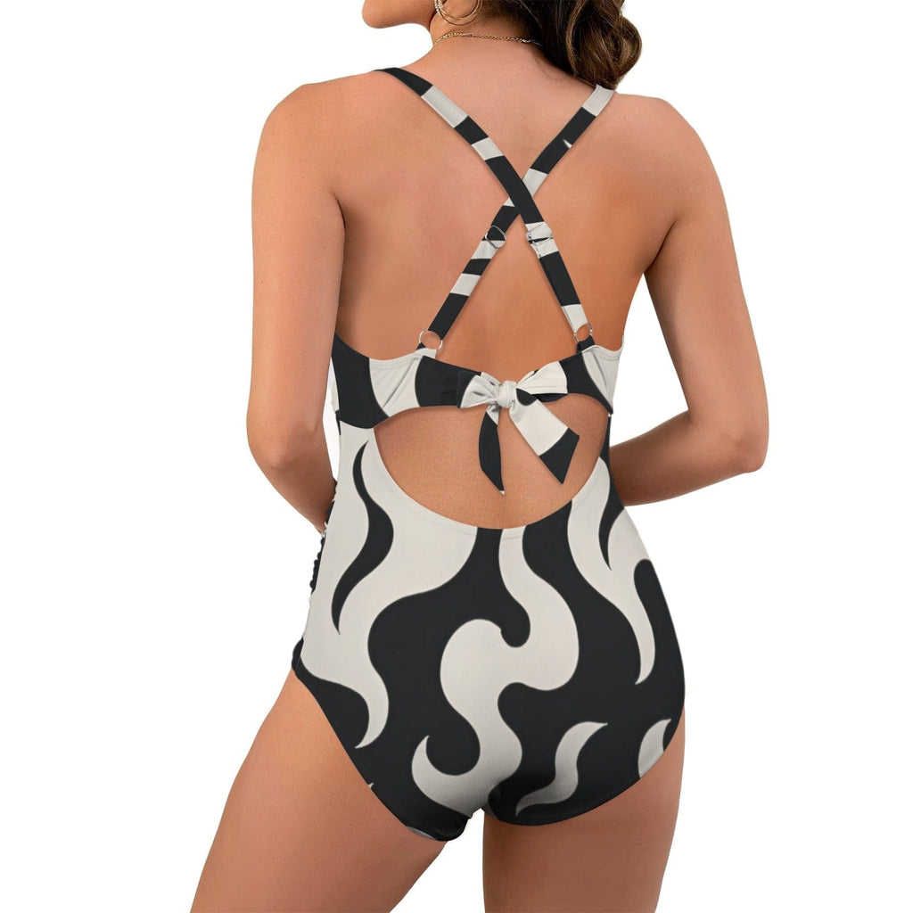 Puff print twist-front swimsuit, neckline and twist detail close-up