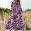 Purple kush print long sleeve dress in white, flat lay