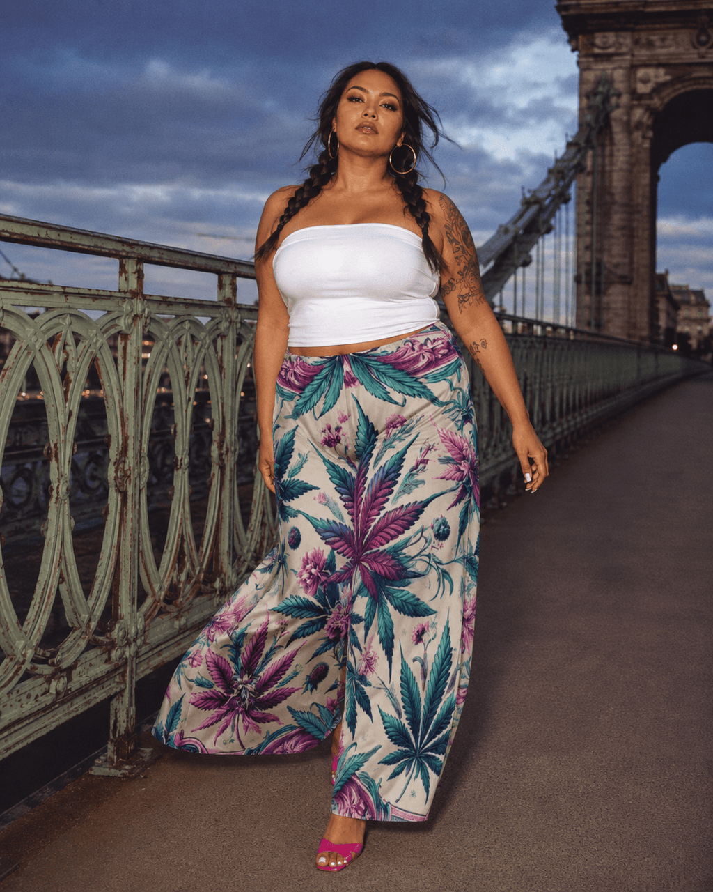 Graphic print wide leg flow pants, close-up showing fabric and print detail