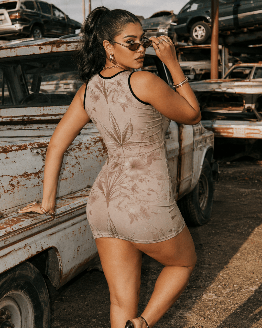 Rosey G rose graphic print sleeveless tank dress, side view on model