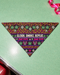 Sleigh. Smoke. Repeat Dog Scarf laid flat showing its triangular shape and holiday leopard print
