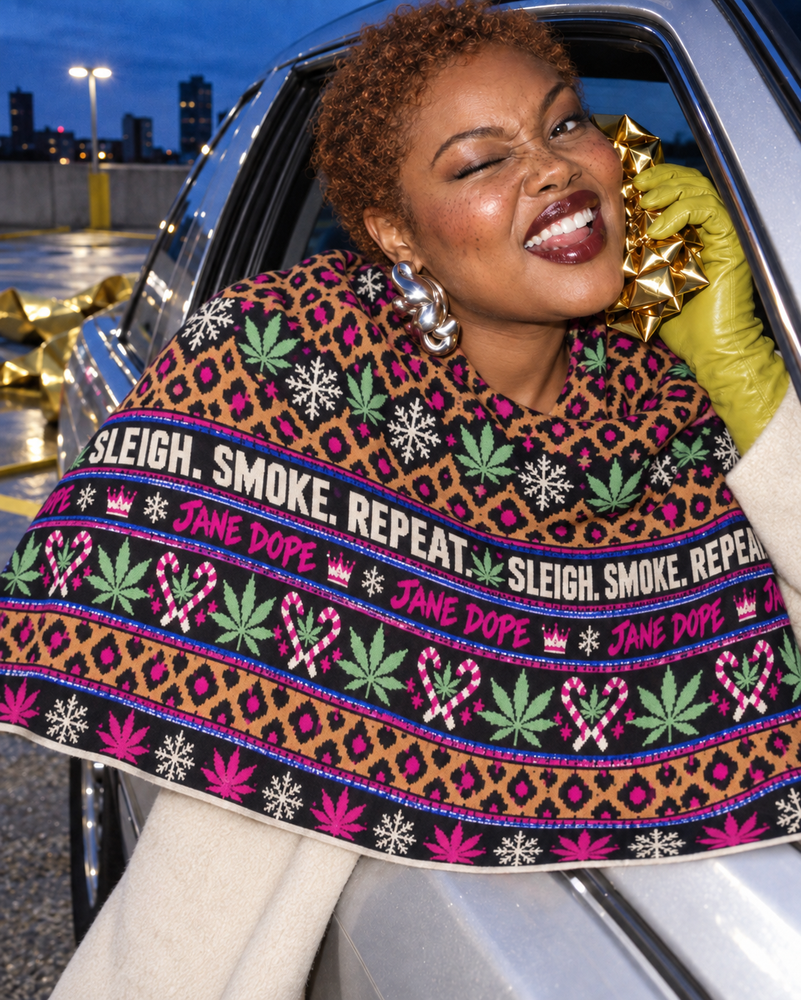 Close editorial view of the Sleigh. Smoke. Repeat Large Scarf draped across the shoulders, showing its printed bands and soft folds.