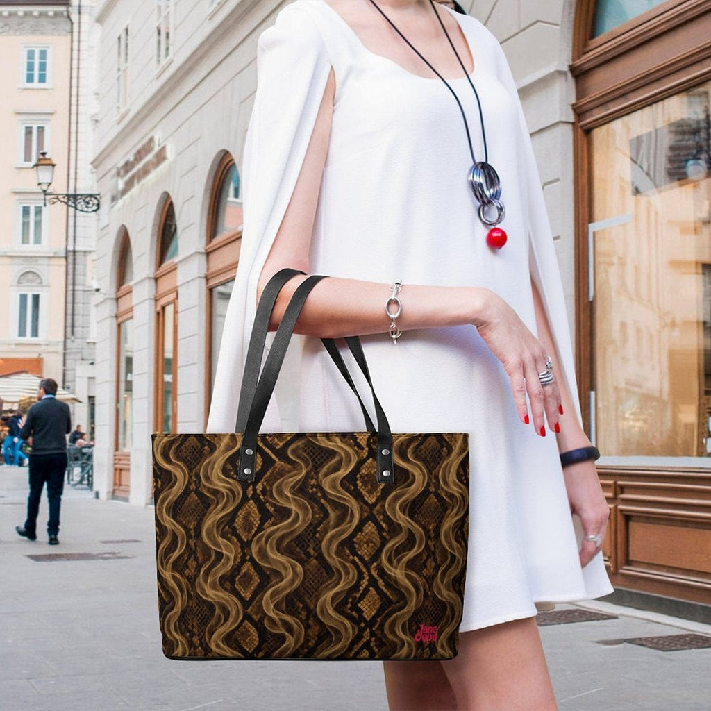 Snake skin print leather tote, clasp and zip detail close-up