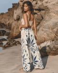 Soft sativa leaf print wide leg lounge pants, three-quarter view on model
