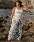 Soft sativa leaf print wide leg lounge pants, walking shot showing fabric movement