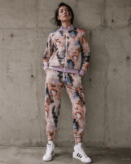 Jane Dope Squad all-over print unisex relaxed fit cotton pants, lifestyle front view on model