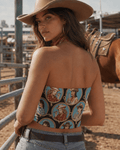 STAMPEDE graphic print crop tube top, styled with denim on model