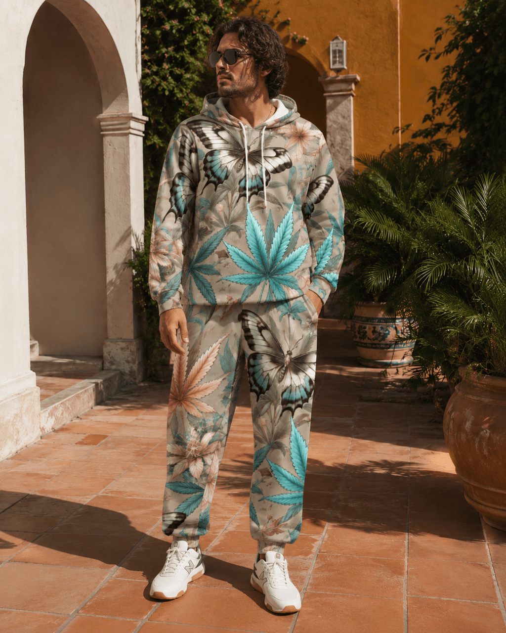 All-over print hoodie and sweatpants set, lifestyle editorial shot on model