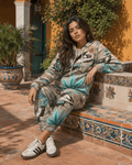 All-over print hoodie and sweatpants set, close-up showing fabric and print detail