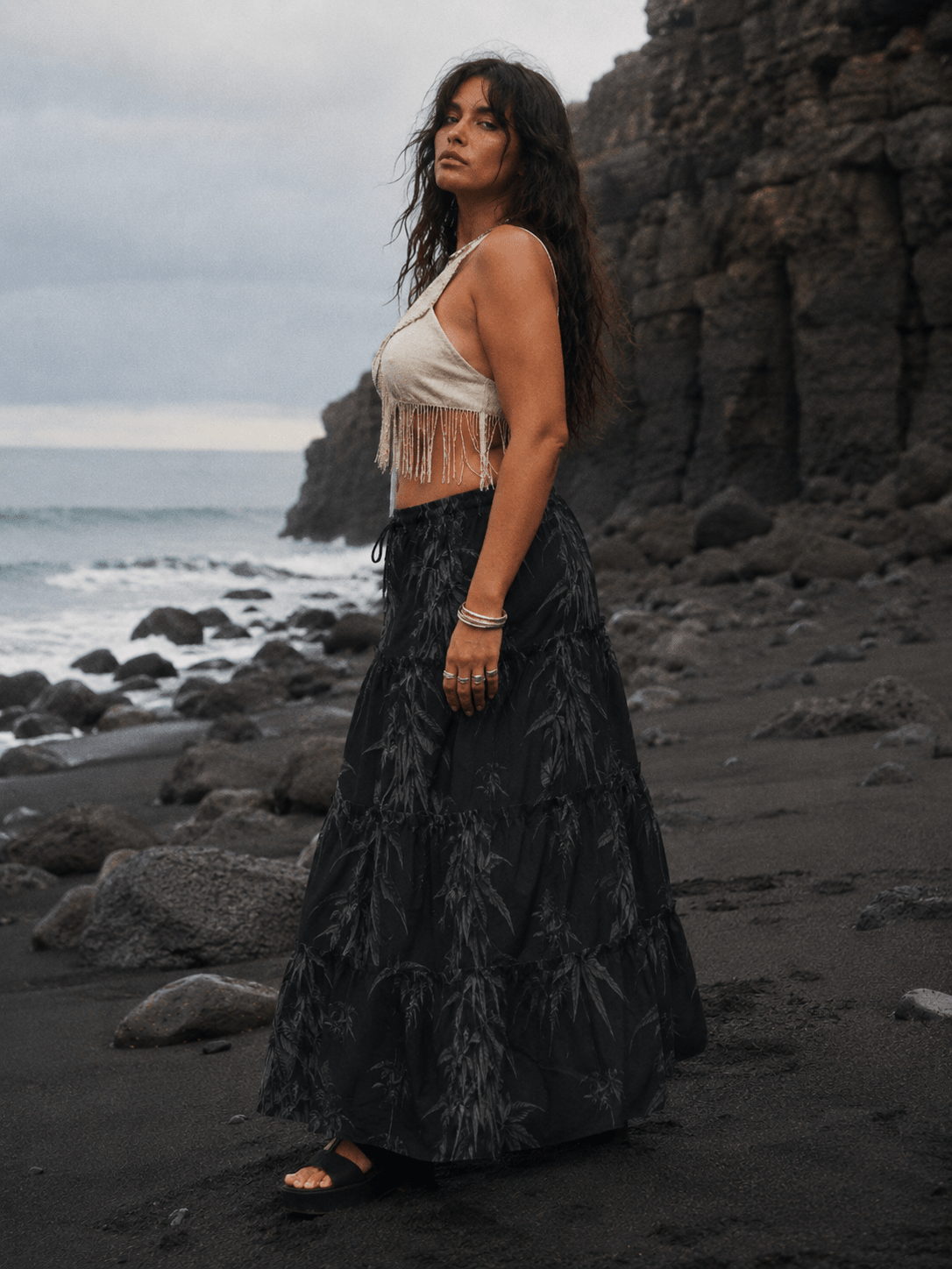 Ethereal smoke print tiered maxi skirt, styled for evening, lifestyle shot