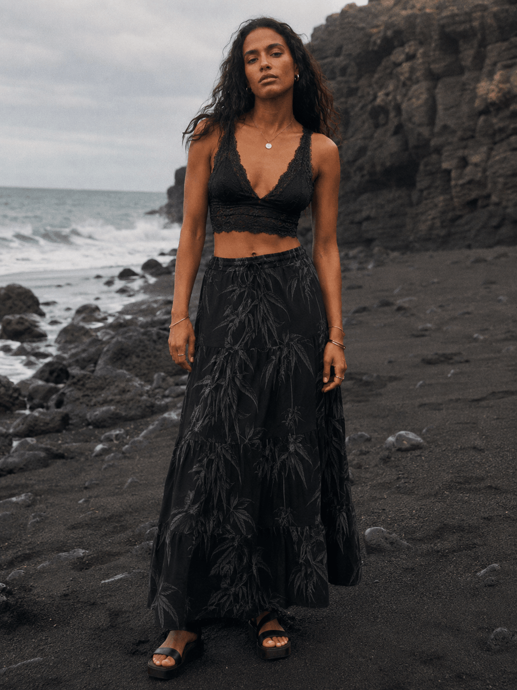 Ethereal smoke print tiered maxi skirt, back view on model outdoors